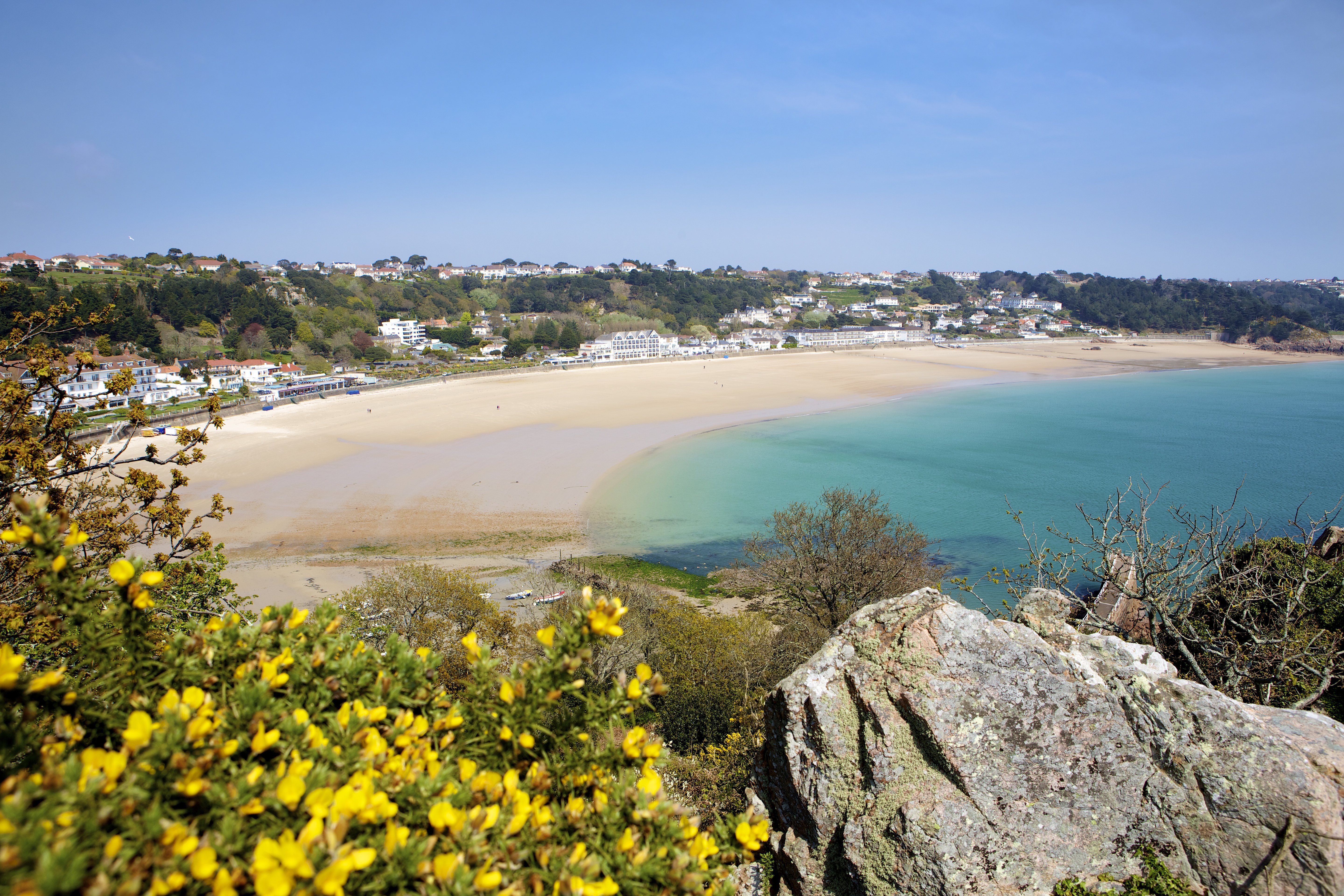 A landscape image of St Brelades Bay from the headland