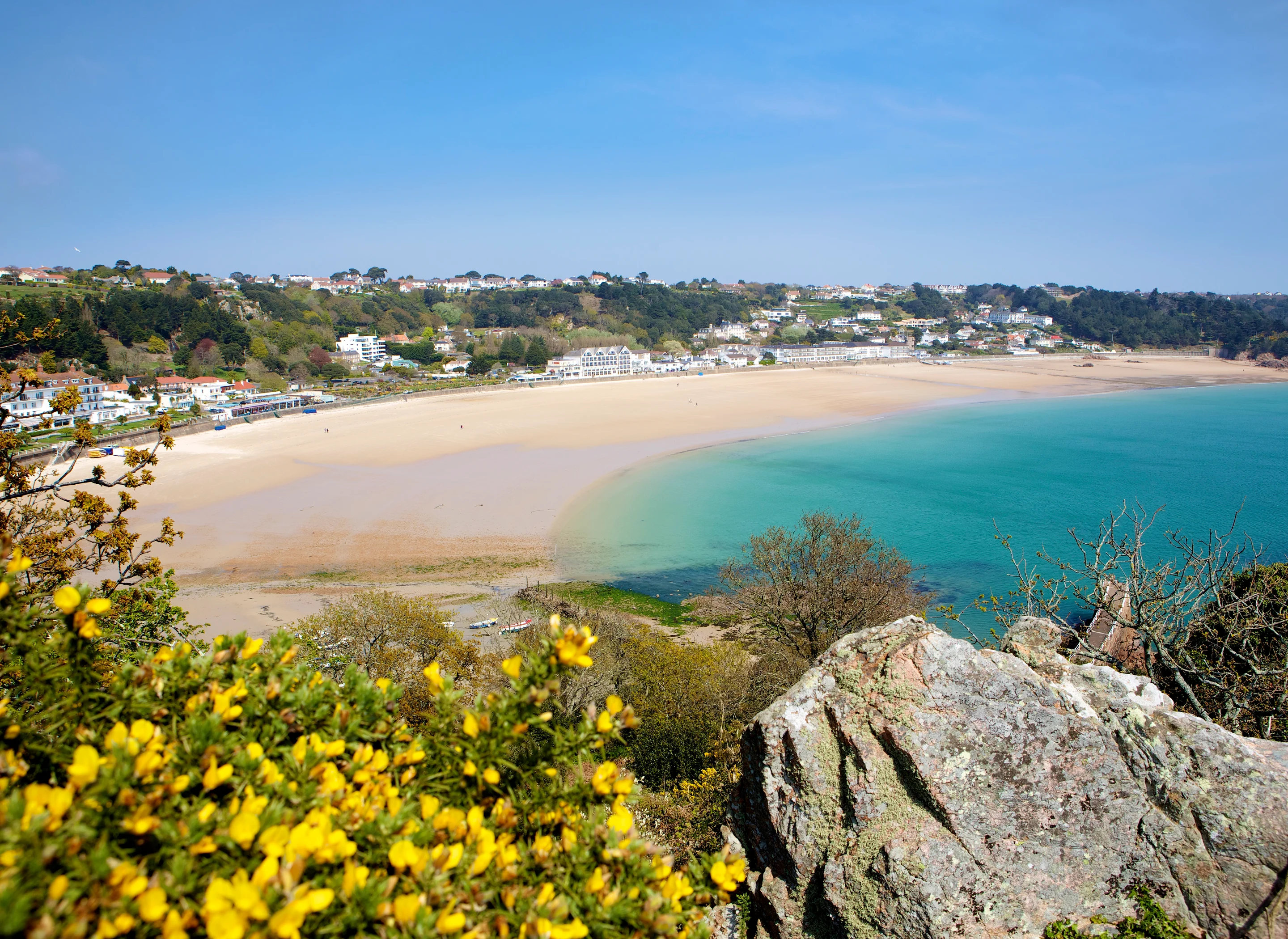 A landscape image of St Brelades Bay from the headland