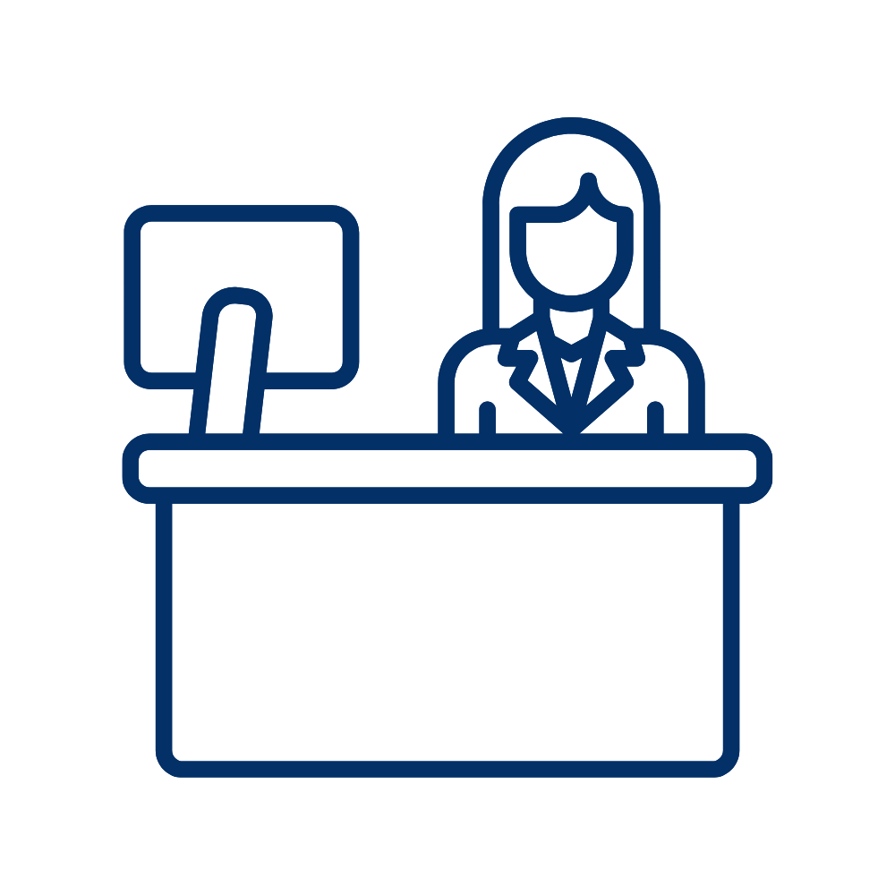 An icon of a reception desk with a team member