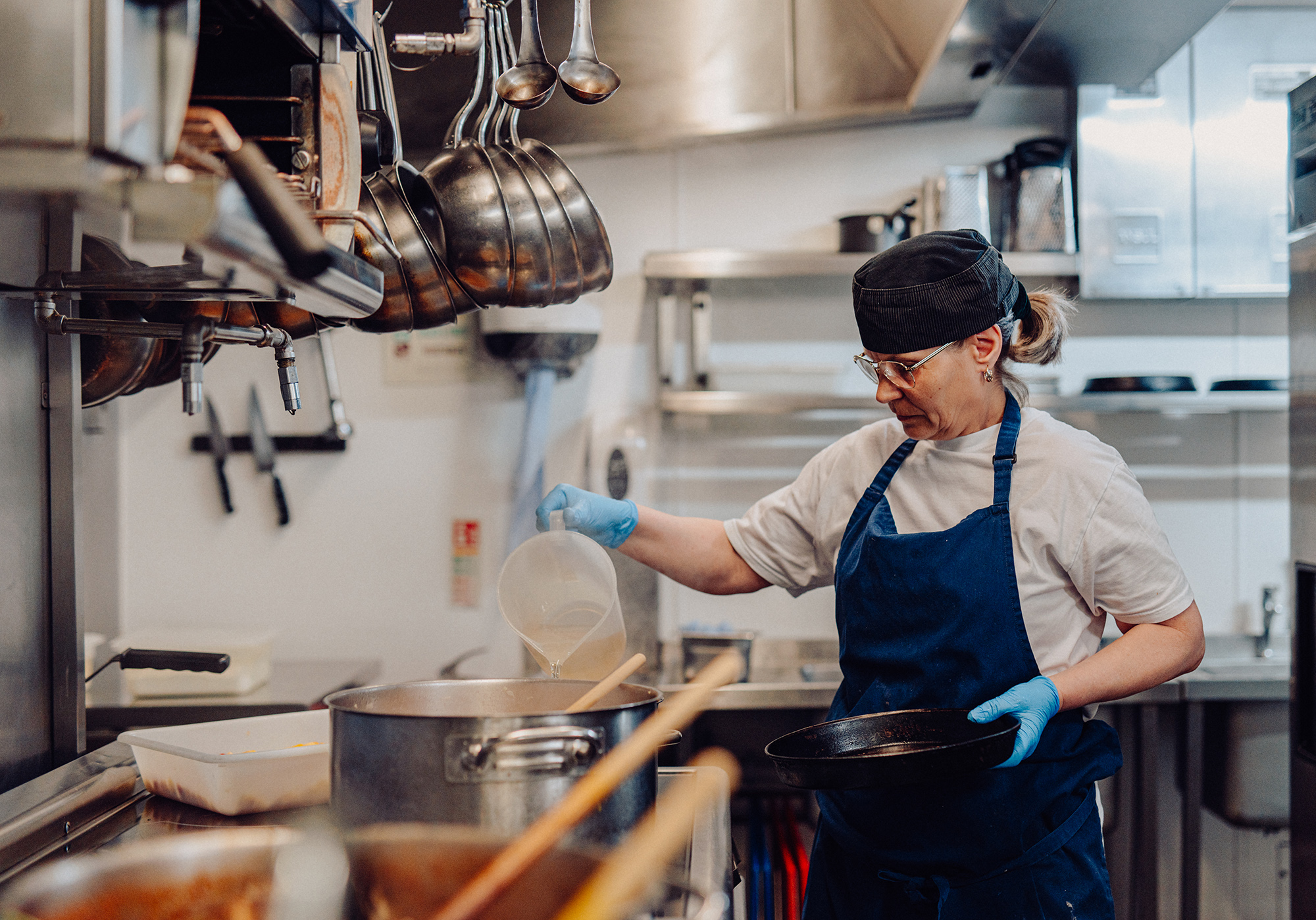 A team member prepares stock in the Beresford House kitchen