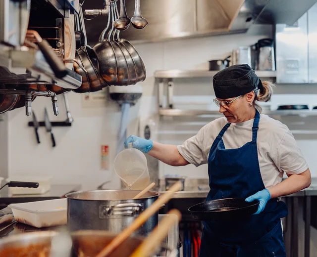 A team member prepares stock in the Beresford House kitchen