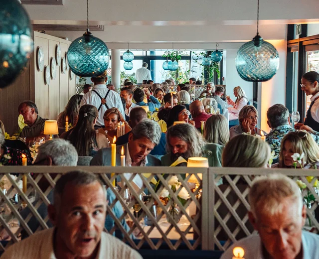 A private takeover event at Oyster Box, showing the dining area full of guests