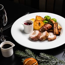 A plate of Christmas turkey with all the trimmings