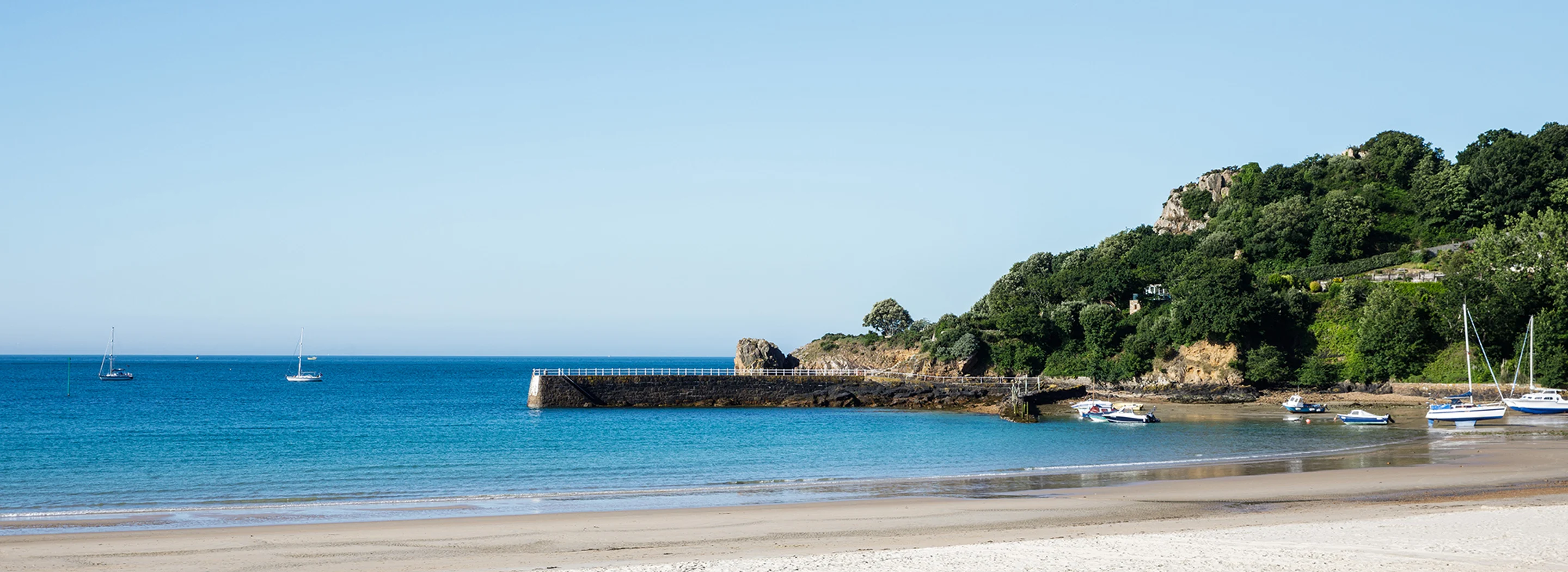 The beach at St Brelade on a sunny day