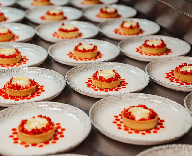 Beautiful desserts wait to be served to guests
