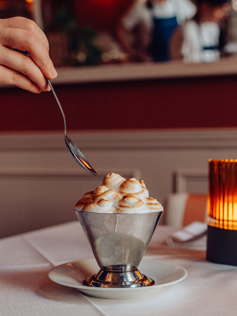 A Baked Alaska Coupe on a table in the Dining Room