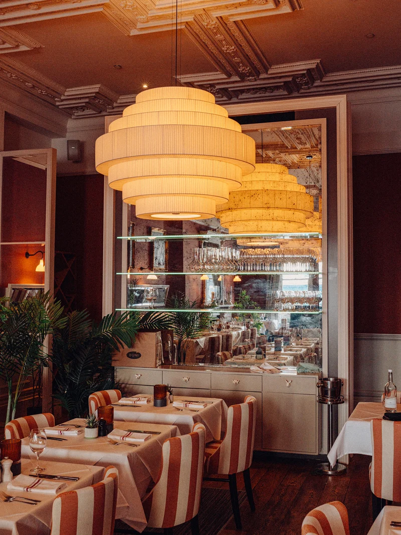 The dining room at Beresford House with large light fittings