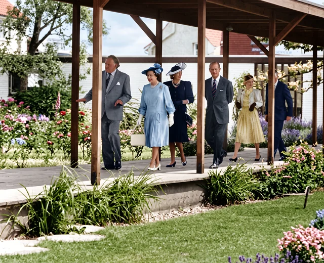 A refined, colourised version of a 1989 photograph showing the Queen visiting Jersey Pottery