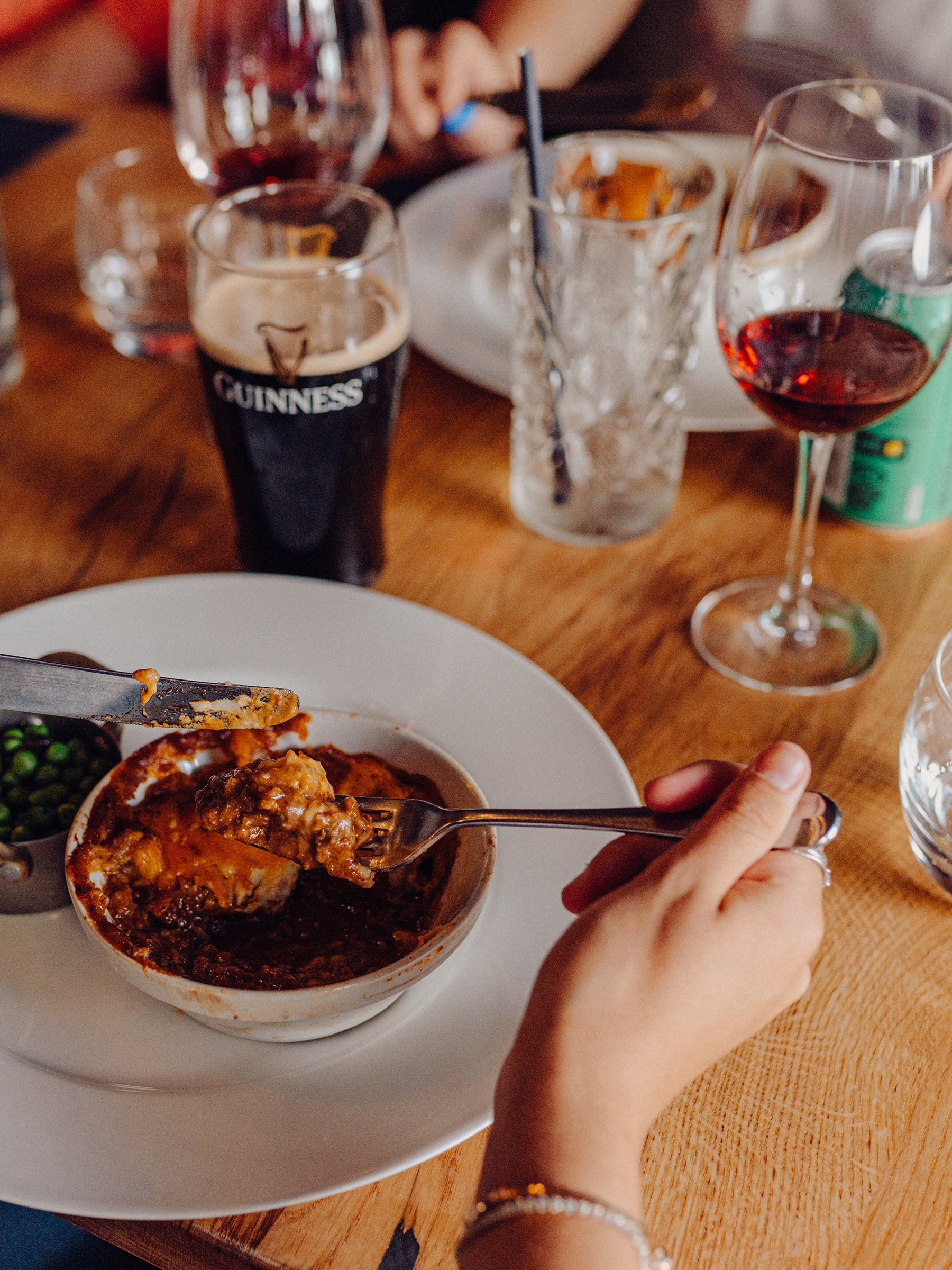 A customer enjoys Shepherds Pie at The Old Vic