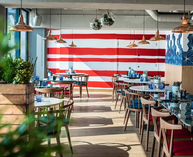 A view from the entrance of Jersey Crab Shack looking down the rows of tables